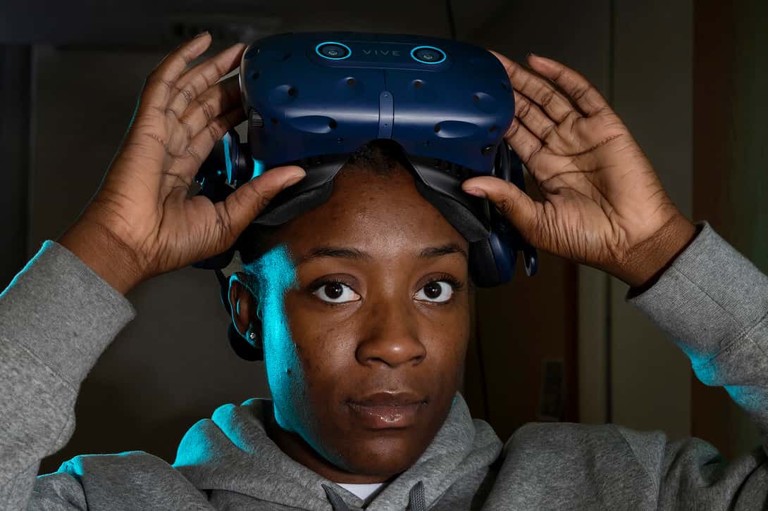 Adaobi Nebuwa, a student studying computer science, puts on a virtual reality headset