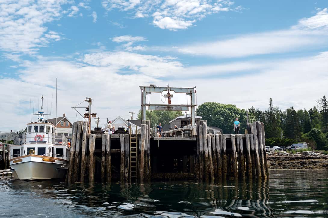 Wharf and boat on the coast of Maine