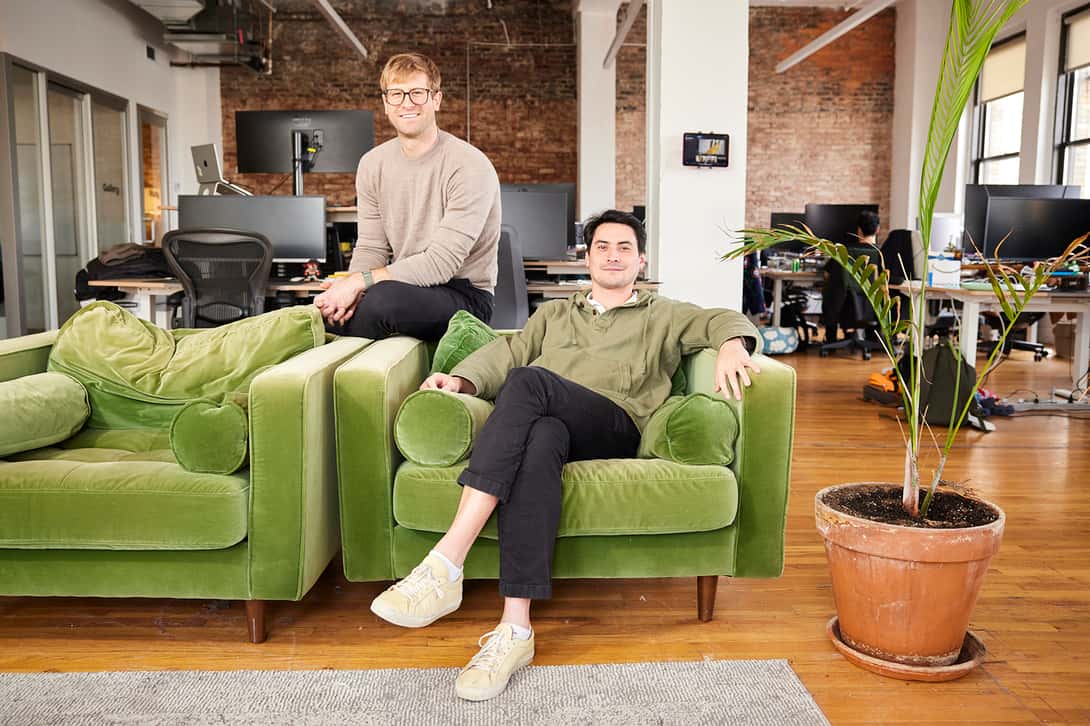 Two 30-something men in their loft office