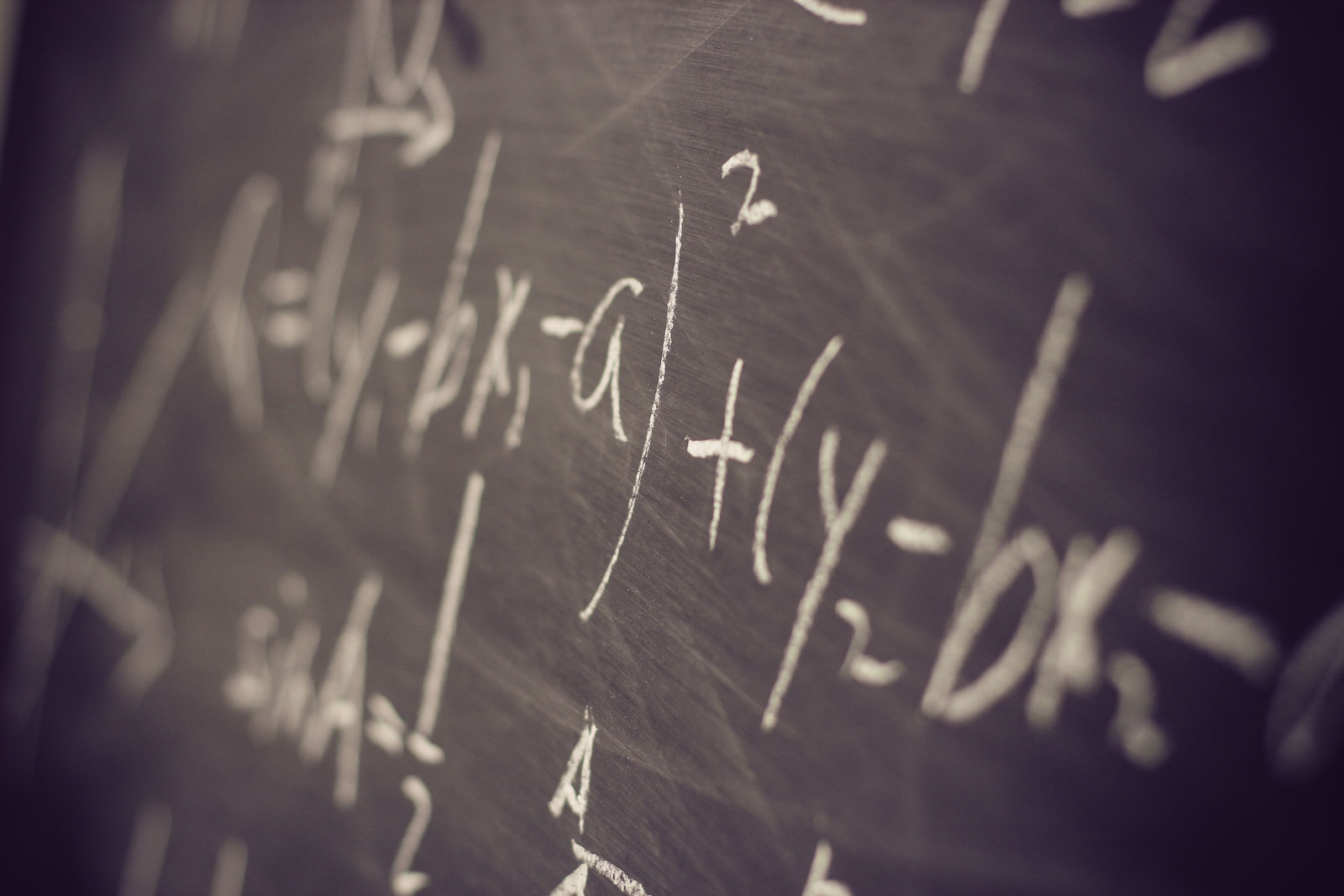 Math equation on black chalk board