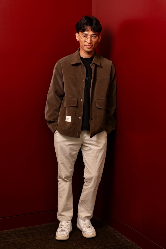 A man facing forward poses for a photo.