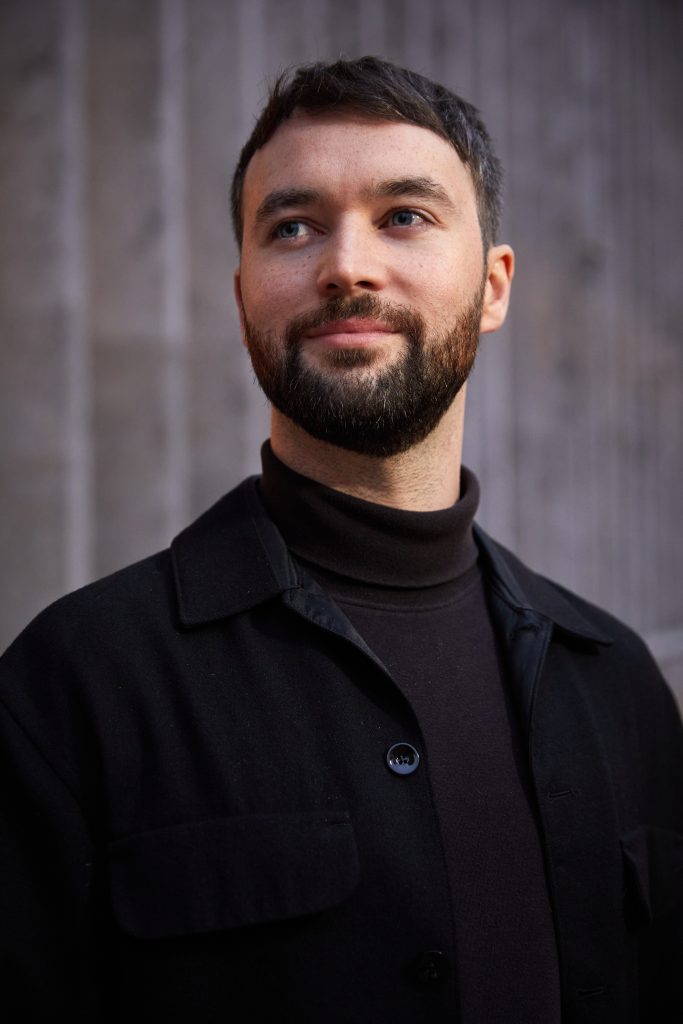 A man poses for a photo.