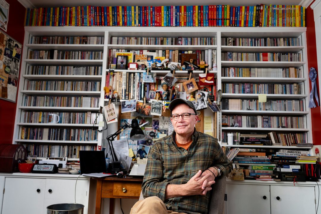 Lincoln Peirce '85 poses for a photo in his home office in Portland, Maine.