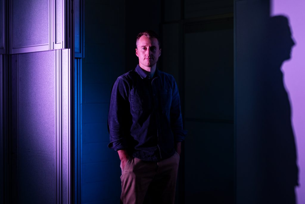 A man poses for a photo.