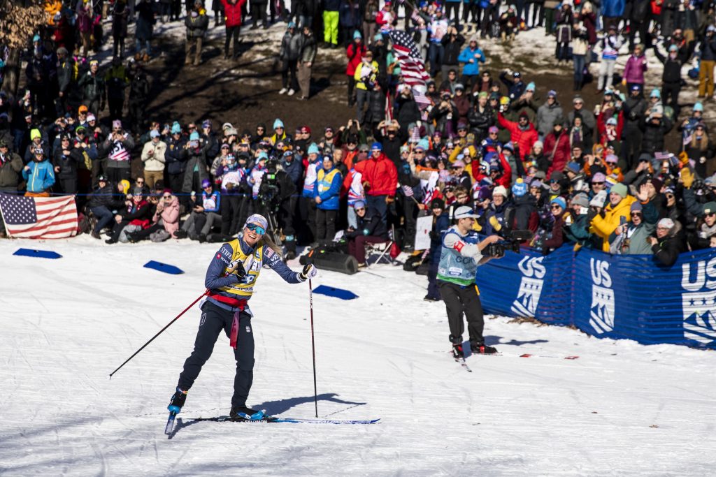 Skier Jessie Diggins smiles during a ski race. 