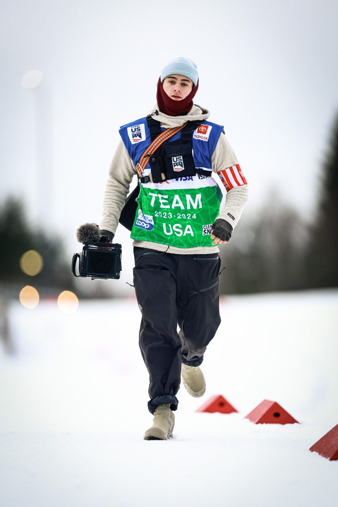Torsten Brinkema '22 runs with the camera while shooting a World Cup event and making a documentary about Olympic champion Jessie Diggins. 