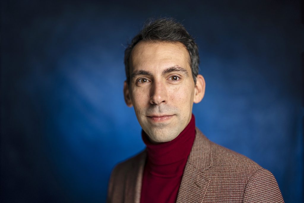 A man poses for a photo.