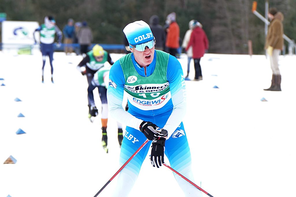 Jack Young '25 ski races during a competition. 