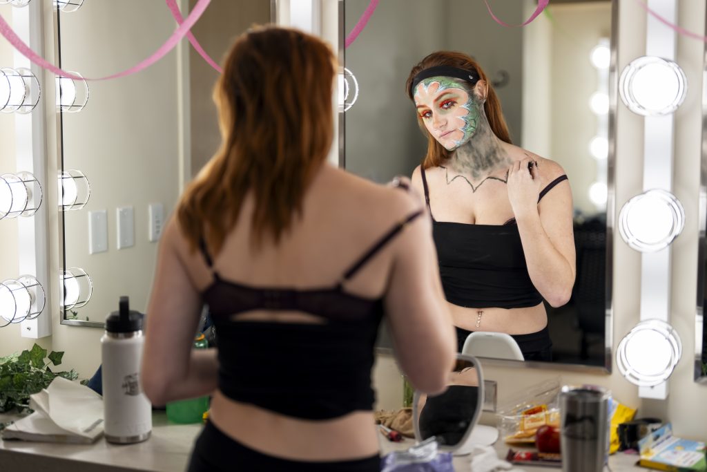Student getting ready for a college theater performance.