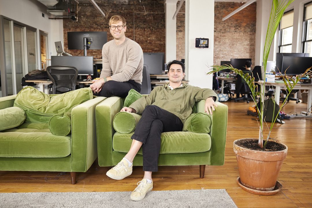 Two 30-something men in their loft office