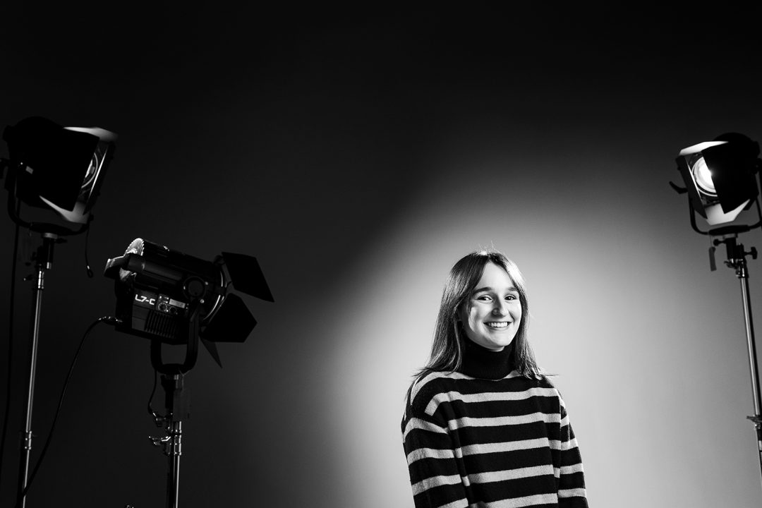 Portrait of a female college student with studio lighting