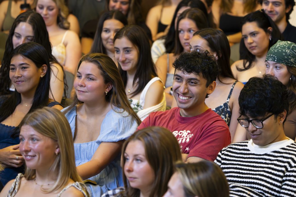 Students smile during the Last Lecture.
