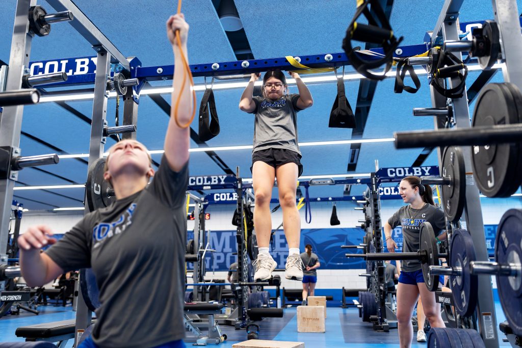 Student athletes in the weight room. 
