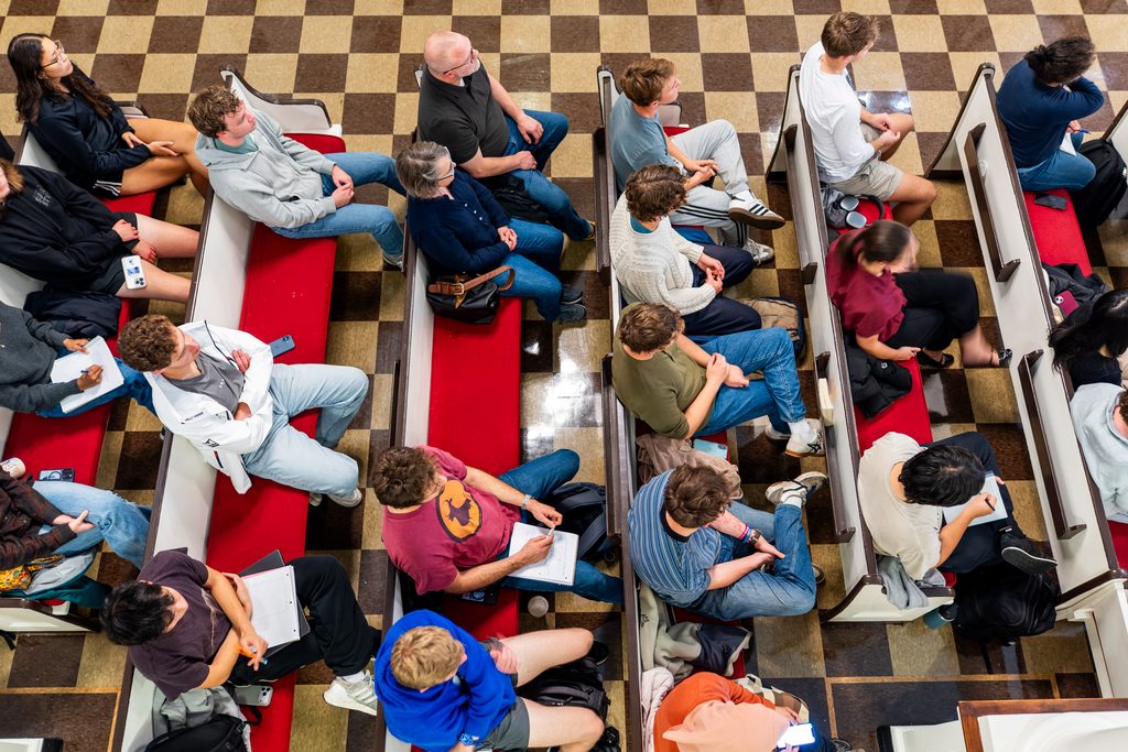 People listen attentively in Lorimer Chapel. 